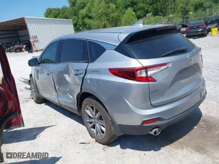 2019 Acura RDX w/Technology Pkg with VIN 5J8TC2H56KL028081, listed as a IAAI auction lot 40042142 with 76,899 mi miles. Bid and sale history available at carsss.com. Image 3.