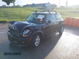 2012 MINI Hardtop with VIN WMWSU3C50CT185690, listed as a IAAI auction lot 42367571 with 63,303 mi miles and . Bid and sale history available at DreamBid. Image 2.