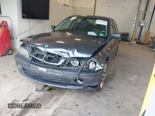 2003 BMW 3 Series 330xi with VIN WBAEW53463PG22999, listed as a IAAI auction lot 41596907 with 160,812 mi miles. Bid and sale history available at carsss.com. Image 2.