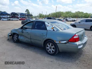 2005 Ford Five Hundred SEL z VIN 1FAFP241X5G118341, wystawiony jako IAAI lot #42012730 z przebiegiem Nie podano mil oraz . Historia ofert i sprzedaży dostępna na DreamBid. Obrazek 13.