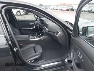 2021 BMW 3 Series 330i xDrive with VIN 3MW5R7J08M8C16500, listed as a IAAI auction lot 41469052 with 21,660 mi miles. Bid and sale history available at carsss.com. Image 5.