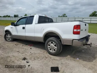 2005 Ford F-150 XLT with VIN 1FTPX12585NA85964, listed as a Copart auction lot 54928615 with 233,380 mi miles and Salvage title. Bid and sale history available at DreamBid. Image 2.