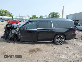 2015 Chevrolet Suburban LT with VIN 1GNSKJKC4FR222178, listed as a IAAI auction lot 42423080 with 234,870 mi miles and . Bid and sale history available at DreamBid. Image 14.