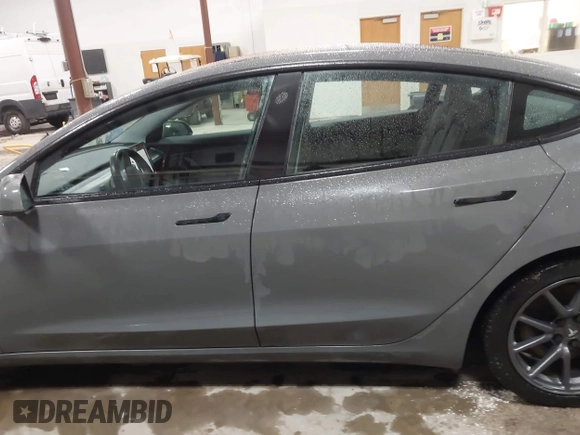 2018 Tesla Model 3 Long Range Battery with VIN 5YJ3E1EB8JF113566, listed as a IAAI auction lot 41726484 with 91,255 mi miles and . Bid and sale history available at DreamBid. Image 14.