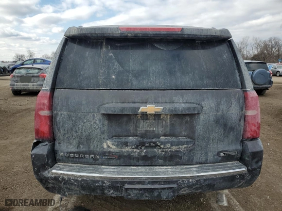 2017 Chevrolet Suburban Premier with VIN 1GNSKJKCXHR403076, listed as a Copart auction lot 46606025 with 99,481 mi miles and Salvage Title. Bid and sale history available at carsss.com. Image 6.