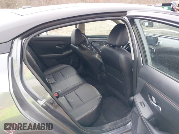 2021 Nissan Sentra SR z VIN 3N1AB8DV4MY302599, wystawiony jako IAAI lot #41662536 z przebiegiem 36 905 mil mil oraz . Historia ofert i sprzedaży dostępna na DreamBid. Obrazek 8.