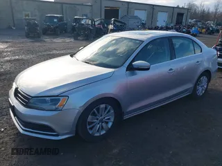 2015 Volkswagen Jetta Sedan 1.8T SE with VIN 3VWD17AJ3FM303470, listed as a IAAI auction lot 41973255 with 90,583 mi miles. Bid and sale history available at carsss.com. Image 2.
