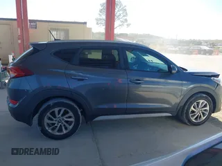 2017 Hyundai Tucson SE with VIN KM8J33A4XHU438510, listed as a IAAI auction lot 42021812 with 117,848 mi miles. Bid and sale history available at carsss.com. Image 13.