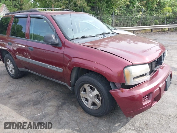 2004 Chevrolet TrailBlazer LS with VIN 1GNDT13S442394308, listed as a IAAI auction lot 42091473 with 214,669 mi miles and . Bid and sale history available at DreamBid. Image 1.