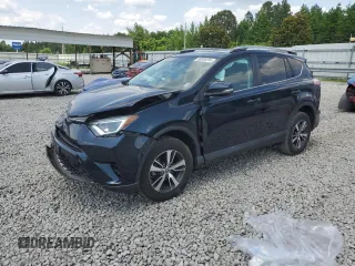 2018 Toyota RAV4 XLE with VIN 2T3WFREVXJW483012, listed as a Copart auction lot 58806205 with 48,266 mi miles and Salvage title. Bid and sale history available at DreamBid. Image 1.