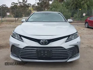 2024 Toyota Camry LE z VIN 4T1C11AK9RU228788, wystawiony jako IAAI lot #42108189 z przebiegiem 26 359 mil mil oraz . Historia ofert i sprzedaży dostępna na DreamBid. Obrazek 12.