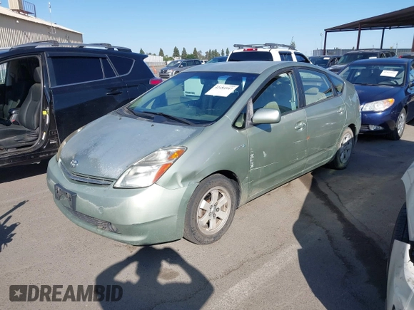 2007 Toyota Prius z VIN JTDKB20U973221624, wystawiony jako IAAI lot #42484947 z przebiegiem 257 311 mil mil oraz . Historia ofert i sprzedaży dostępna na DreamBid. Obrazek 2.