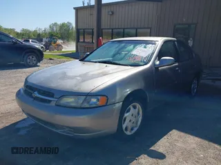 1999 Nissan Altima XE with VIN 1N4DL01D5XC124936, listed as a IAAI auction lot 42031611 with 140,519 mi miles. Bid and sale history available at carsss.com. Image 2.