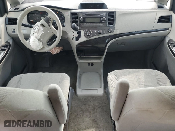 2012 Toyota Sienna with VIN 5TDZK3DC6CS244891, listed as a Copart auction lot 54442055 with 137,680 mi miles and Salvage title. Bid and sale history available at DreamBid. Image 8.