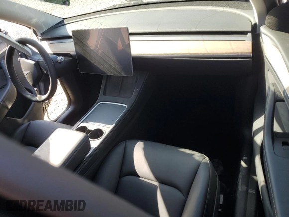 2024 Tesla Model Y Long Range with VIN 7SAYGDEE1RA245642, listed as a Copart auction lot 55490385 with Not provided miles and Salvage title. Bid and sale history available at DreamBid. Image 8.
