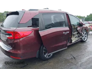 2021 Honda Odyssey Touring with VIN 5FNRL6H88MB006938, listed as a IAAI auction lot 42367022 with 63,280 mi miles and . Bid and sale history available at DreamBid. Image 16.