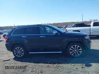 2018 Jeep Grand Cherokee High Altitude with VIN 1C4RJFCT6JC102660, listed as a IAAI auction lot 41752965 with 119,841 mi miles. Bid and sale history available at carsss.com. Image 13.