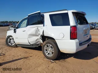 2020 Chevrolet Tahoe LT with VIN 1GNSKBKC1LR264762, listed as a IAAI auction lot 41037026 with 95,644 mi miles. Bid and sale history available at carsss.com. Image 3.