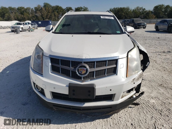 2012 Cadillac SRX Performance Collection with VIN 3GYFNEE33CS659161, listed as a Copart auction lot 76071724 with 149,586 mi miles and Salvage title. Bid and sale history available at DreamBid. Image 4.