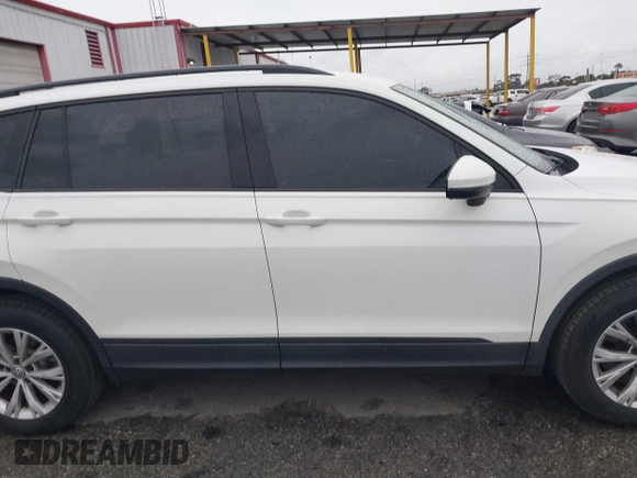 2019 Volkswagen Tiguan S z VIN 3VV1B7AX7KM018189, wystawiony jako IAAI lot #41741924 z przebiegiem 61 740 mil mil oraz . Historia ofert i sprzedaży dostępna na DreamBid. Obrazek 13.