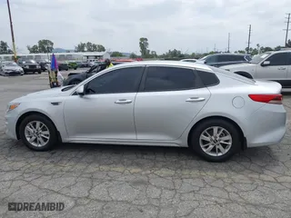 2016 Kia Optima LX with VIN KNAGT4L3XG5111796, listed as a IAAI auction lot 42106116 with 138,184 mi miles. Bid and sale history available at carsss.com. Image 14.