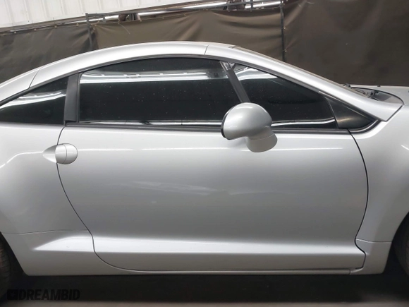 2007 Mitsubishi Eclipse GS with VIN 4A3AK24F47E011540, listed as a IAAI auction lot 42053739 with 174,083 mi miles. Bid and sale history available at carsss.com. Image 14.