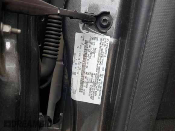 2017 Ford Focus Titanium z VIN 1FADP3N29HL240527, wystawiony jako Copart lot #62891695 z przebiegiem 126 926 mil mil oraz Szkoda całkowita • Salvage title. Historia ofert i sprzedaży dostępna na DreamBid. Obrazek 12.