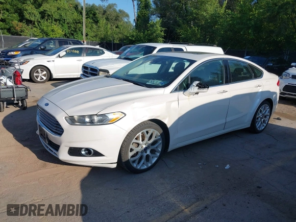 2014 Ford Fusion Titanium with VIN 3FA6P0K95ER128961, listed as a IAAI auction lot 42750668 with 197,188 mi miles and . Bid and sale history available at DreamBid. Image 2.