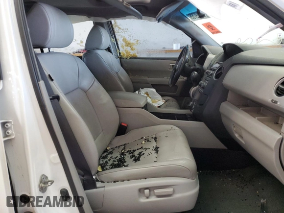 2014 Honda Pilot Touring z VIN 5FNYF4H99EB011079, wystawiony jako Copart lot #57869765 z przebiegiem Nie podano mil oraz Szkoda całkowita • Salvage title. Historia ofert i sprzedaży dostępna na DreamBid. Obrazek 7.