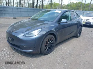 2020 Tesla Model Y Long Range with VIN 5YJYGDEE2LF029385, listed as a IAAI auction lot 42164786 with 58,685 mi miles and . Bid and sale history available at DreamBid. Image 19.