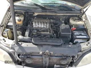 2005 Kia Sedona LX with VIN KNDUP132656684850, listed as a Copart auction lot 80095484 with 182,199 mi miles and Non Repairable. Bid and sale history available at carsss.com. Image 12.