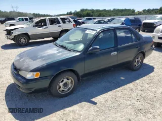 1999 Toyota Corolla VE with VIN 1NXBR12E4XZ240034, listed as a Copart auction lot 55860355 with 252,442 mi miles and Salvage title. Bid and sale history available at DreamBid. Image 1.