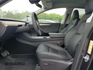 2024 Tesla Model Y Long Range с VIN 7SAYGDEE3RA328991, выставлен на аукционе Copart как лот 56637455 с пробегом Не указан миль и Списание • Salvage title. История ставок и продаж доступна на DreamBid. Изображение 7.