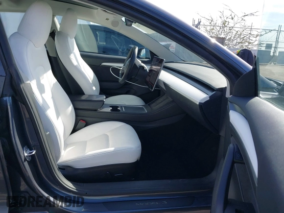 2023 Tesla Model 3 Performance with VIN 5YJ3E1EC4PF705449, listed as a IAAI auction lot 41587026 with 30,292 mi miles. Bid and sale history available at carsss.com. Image 5.