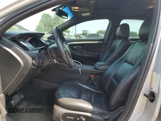 2015 Ford Taurus SEL with VIN 1FAHP2H80FG169106, listed as a Copart auction lot 66280615 with 167,290 mi miles and Clean title. Bid and sale history available at DreamBid. Image 7.