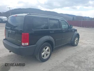 2007 Dodge Nitro SXT with VIN 1D8GU28K27W569672, listed as a IAAI auction lot 41868853 with 179,145 mi miles and . Bid and sale history available at carsss.com. Image 4.