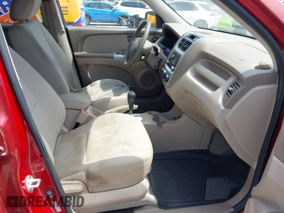 2009 Kia Sportage LX with VIN KNDJE723897599966, listed as a IAAI auction lot 42107627 with 118,512 mi miles. Bid and sale history available at carsss.com. Image 5.