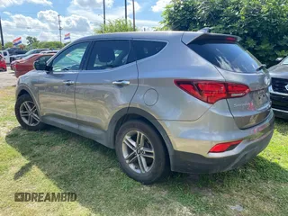 2017 Hyundai Santa Fe 2.4L with VIN 5NMZTDLB8HH029955, listed as a IAAI auction lot 42612654 with 153,050 mi miles and . Bid and sale history available at DreamBid. Image 3.