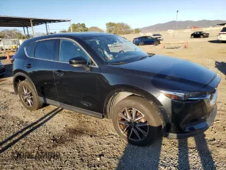 2018 Mazda CX-5 Grand Touring with VIN JM3KFBDMXJ0318474, listed as a Copart auction lot 46438545 with 58,702 mi miles and Salvage Title. Bid and sale history available at DreamBid. Image 4.