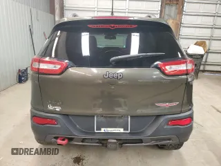 2015 Jeep Cherokee Trailhawk z VIN 1C4PJMBS8FW665607, wystawiony jako Copart lot #51536715 z przebiegiem 166 443 mil mil oraz Szkoda całkowita • Salvage title. Historia ofert i sprzedaży dostępna na DreamBid. Obrazek 6.