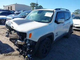 2018 Jeep Renegade Altitude with VIN ZACCJABB7JPJ09675, listed as a IAAI auction lot 41237405 with 64,103 mi miles and . Bid and sale history available at DreamBid. Image 2.
