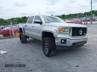 2014 GMC Sierra 1500 SLT z VIN 3GTU2VEC3EG323327, wystawiony jako IAAI lot #42070659 z przebiegiem 153 515 mil mil oraz . Historia ofert i sprzedaży dostępna na DreamBid. Obrazek 1.