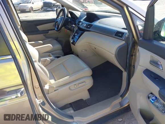 2012 Honda Odyssey EX-L with VIN 5FNRL5H63CB016526, listed as a IAAI auction lot 41701396 with 132,016 mi miles and . Bid and sale history available at carsss.com. Image 5.