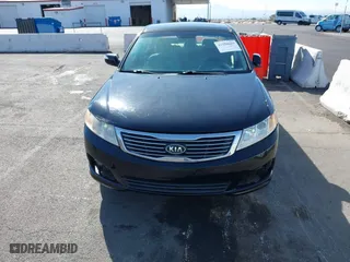 2009 Kia Optima LX with VIN KNAGE228895356658, listed as a IAAI auction lot 41580009 with 216,534 mi miles. Bid and sale history available at carsss.com. Image 6.