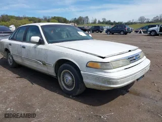 1997 Ford Crown Victoria with VIN 2FALP73W3VX234200, listed as a IAAI auction lot 41856421 with 144,599 mi miles. Bid and sale history available at carsss.com. Image 1.