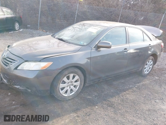 2007 Toyota Camry LE with VIN 4T1BK46KX7U525522, listed as a IAAI auction lot 41198095 with 77,465 mi miles and . Bid and sale history available at DreamBid. Image 2.