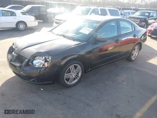 2004 Mitsubishi Galant ES with VIN 4A3AB36F74E077627, listed as a IAAI auction lot 41734910 with 196,299 mi miles. Bid and sale history available at carsss.com. Image 17.