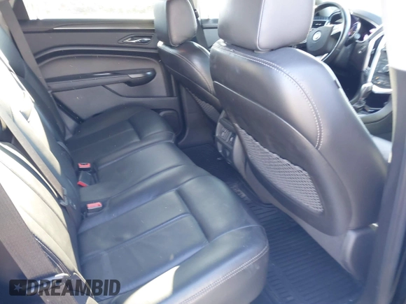 2012 Cadillac SRX with VIN 3GYFNGE32CS570497, listed as a IAAI auction lot 41625436 with 176,960 mi miles and . Bid and sale history available at DreamBid. Image 8.