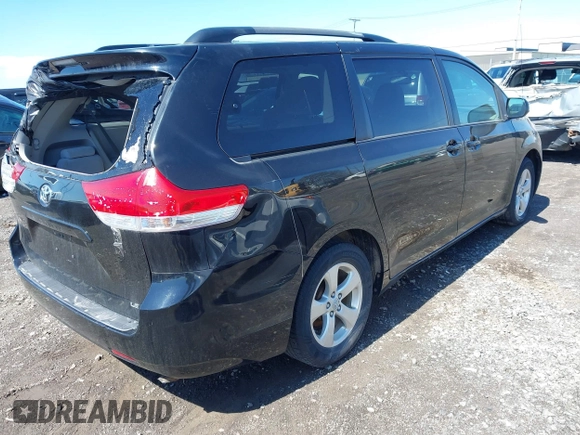 2014 Toyota Sienna LE AAS with VIN 5TDKK3DC4ES445998, listed as a IAAI auction lot 42093872 with 220,943 mi miles. Bid and sale history available at carsss.com. Image 4.