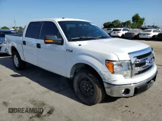 2014 Ford F-150 XL with VIN 1FTFW1CT1EKE22892, listed as a Copart auction lot 61635265 with 14,203 mi miles and Salvage title. Bid and sale history available at DreamBid. Image 4.